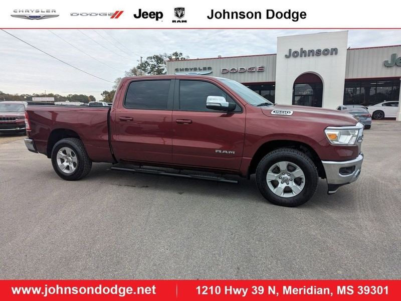 2021 RAM 1500 Big Horn in a Delmonico Red Pearl Coat exterior color and Diesel Gray/Blackinterior. Johnson Dodge 601-693-6343 pixelmotiondemo.com 
