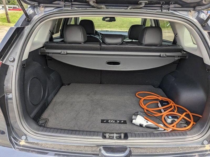 2022 Kia Niro EV EX Premium in a Gravity Blue exterior color and Charcoalinterior. Johnson Dodge 601-693-6343 pixelmotiondemo.com 