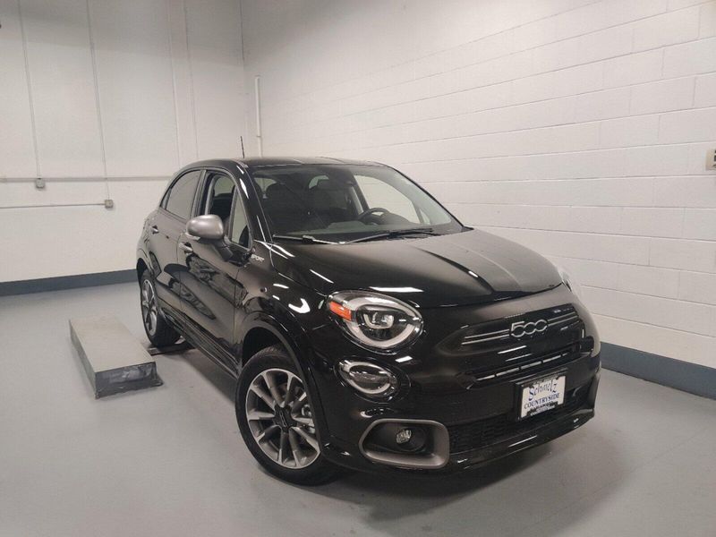 2023 Fiat 500x Sport Awd in a Nero Cinema (Black Clear Coat) exterior color and Black Heated Sport Seatsinterior. Schmelz Countryside Alfa Romeo and Fiat (651) 968-0556 schmelzfiat.com 