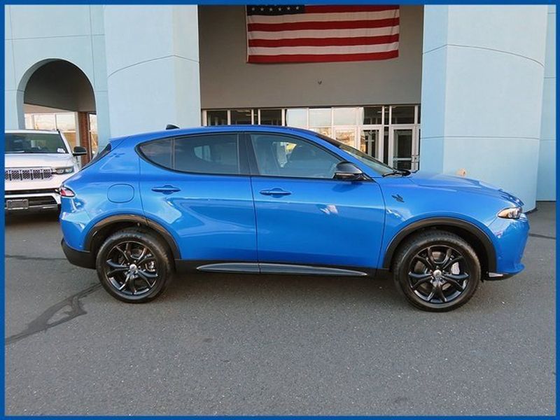 2024 Dodge Hornet R/T in a Blu Bayou exterior color and Blackinterior. Papas Jeep Ram In New Britain, CT 860-356-0523 papasjeepram.com 