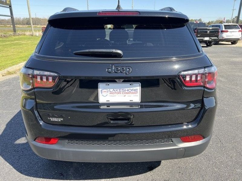 2023 Jeep Compass Altitude 4x4 in a Diamond Black Crystal Pearl Coat exterior color and Blackinterior. Lakeshore CDJR Seaford 302-213-6058 lakeshorecdjr.com 