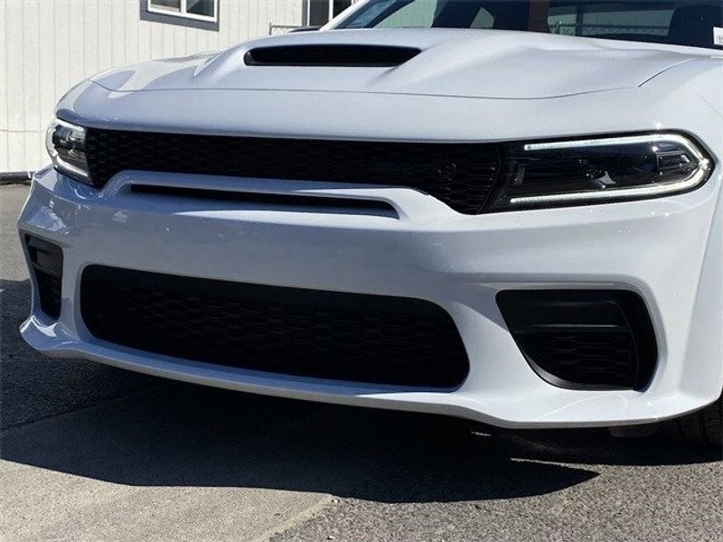 2023 Dodge Charger Srt Hellcat Widebody Jailbreak in a White Knuckle exterior color and Demonic Red/Blackinterior. McPeek
