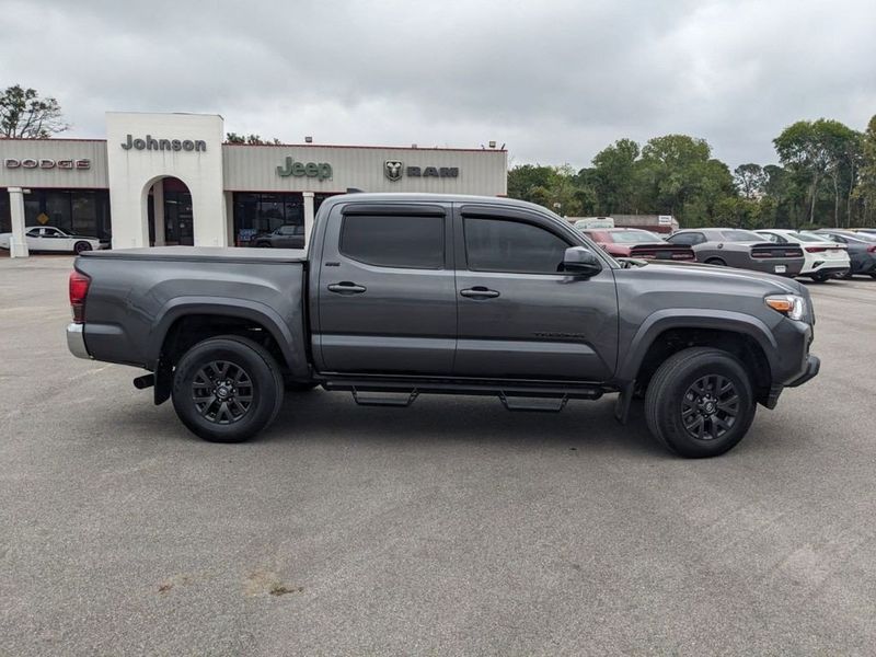 2022 Toyota Tacoma SR5 in a Magnetic Gray Metallic exterior color and Cementinterior. Johnson Dodge 601-693-6343 pixelmotiondemo.com 