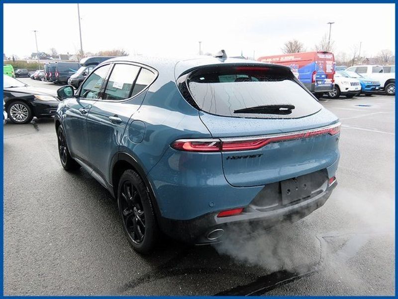 2024 Dodge Hornet R/T Plus in a Blue Steele exterior color and Blackinterior. Papas Jeep Ram In New Britain, CT 860-356-0523 papasjeepram.com 