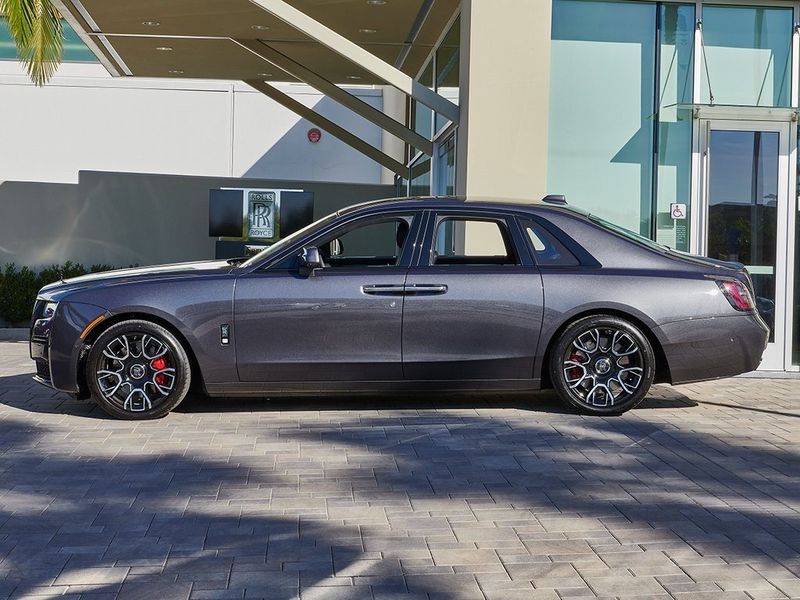 2024 Rolls-Royce Ghost  in a Gunmetal exterior color and Forge Yellowinterior. SHELLY AUTOMOTIVE shellyautomotive.com 