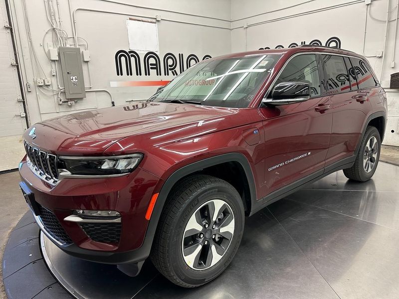 2024 Jeep Grand Cherokee 4xe in a Velvet Red Pearl Coat exterior color and Global Blackinterior. Marina Auto Group (855) 564-8688 marinaautogroup.com 