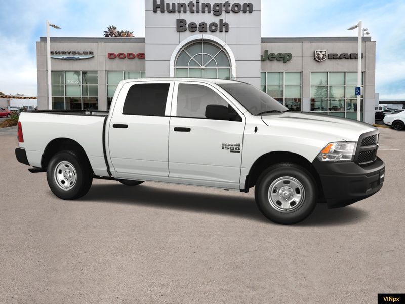 2023 RAM 1500 Classic Tradesman Crew Cab 4x4 in a Bright White exterior color and Blackinterior. BEACH BLVD OF CARS beachblvdofcars.com 