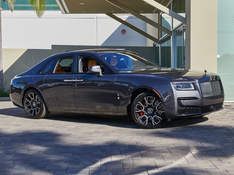 2024 Rolls-Royce Ghost  in a Gunmetal exterior color and Forge Yellowinterior. SHELLY AUTOMOTIVE shellyautomotive.com 