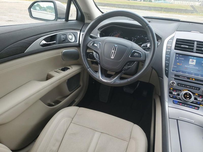 2020 Lincoln MKZ Reserve in a BROWN exterior color. Johnson Dodge 601-693-6343 pixelmotiondemo.com 