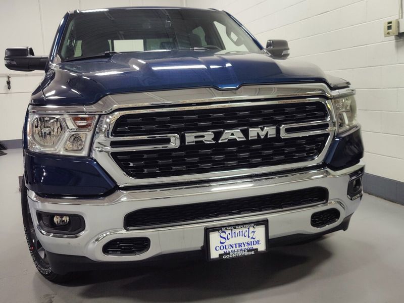 2023 RAM 1500 Big Horn Crew Cab 4x4 w/Heated Seats in a Patriot Blue Pearl Coat exterior color and Diesel Gray/Black Heated Seatsinterior. Schmelz Countryside Alfa Romeo (651) 867-3222 schmelzalfaromeo.com 