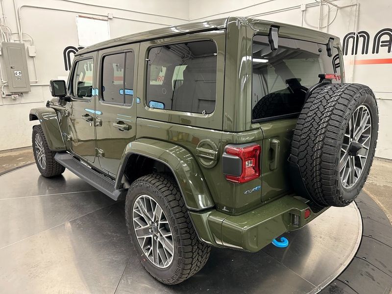 2024 Jeep Wrangler 4-door High Altitude 4xe in a Sarge Green Clear Coat exterior color and Green/Blackinterior. Marina Chrysler Dodge Jeep RAM (855) 616-8084 marinadodgeny.com 