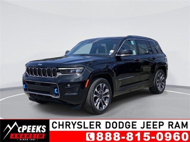 2023 Jeep Grand Cherokee Overland 4xe in a Diamond Black Crystal Pearl Coat exterior color and Global Blackinterior. McPeek