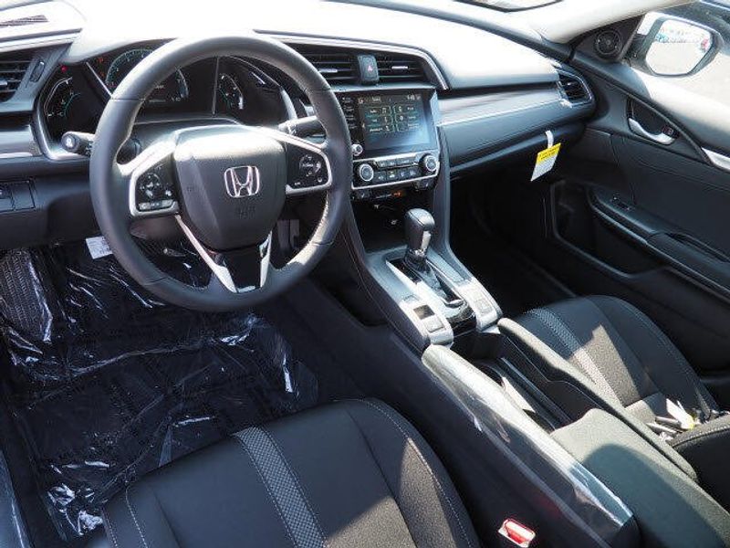 2020 Honda Civic Sedan EX in a Lunar Silver Metallic exterior color and Blackinterior. BEACH BLVD OF CARS beachblvdofcars.com 