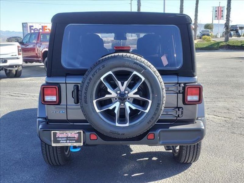 2024 Jeep Wrangler Sport S 4xe in a Granite Crystal Metallic Clear Coat exterior color and Blackinterior. Perris Valley Auto Center 951-657-6100 perrisvalleyautocenter.com 