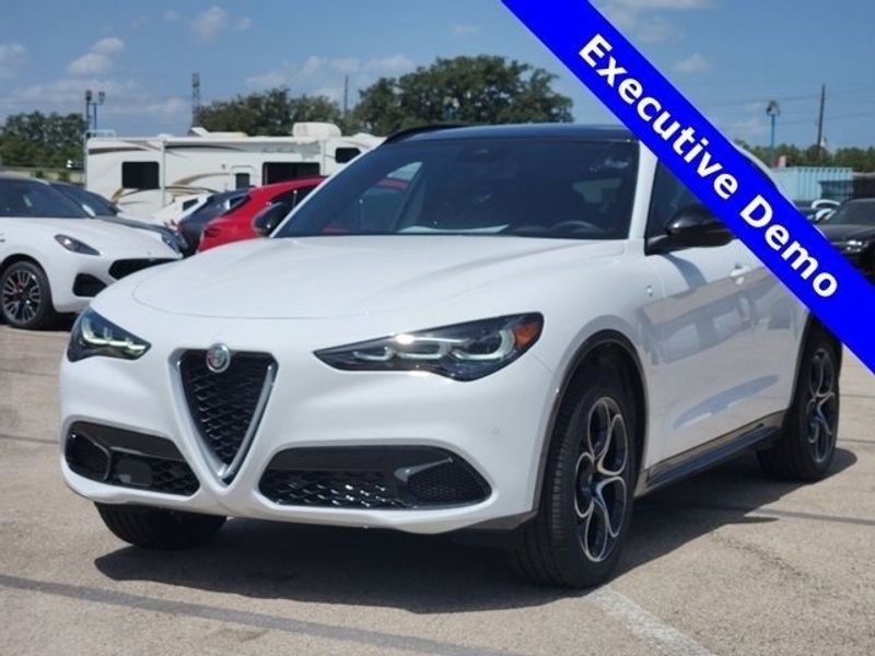 2024 Alfa Romeo Stelvio Ti in a Alfa White exterior color and Blackinterior. Northside Imports Houston 281-475-4549 northsideimportshouston.com 