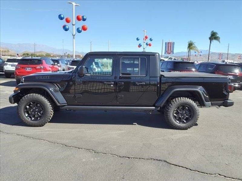 2023 Jeep Gladiator Willys 4x4 in a Black Clear Coat exterior color and Blackinterior. Perris Valley Chrysler Dodge Jeep Ram 951-355-1970 perrisvalleydodgejeepchrysler.com 
