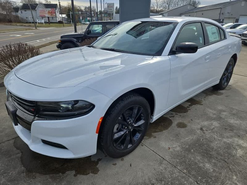 2023 Dodge Charger SXT Awd in a White Knuckle exterior color and Blackinterior. Dave Warren Chrysler Dodge Jeep Ram (716) 708-1207 davewarrenchryslerdodgejeepram.com 