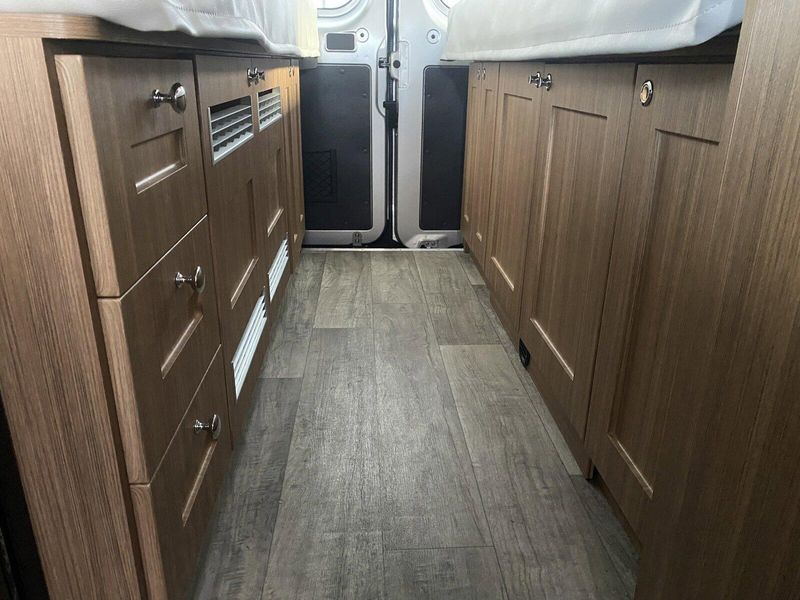2024 ROADTREK Pivot  in a Silver Metallic exterior color and Chestnut Browninterior. Legacy Powersports 541-663-1111 legacypowersports.net 