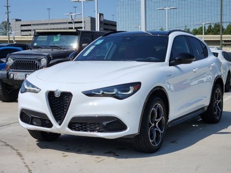 2024 Alfa Romeo Stelvio Veloce in a Alfa White exterior color and Blackinterior. Northside Imports Houston 281-475-4549 northsideimportshouston.com 