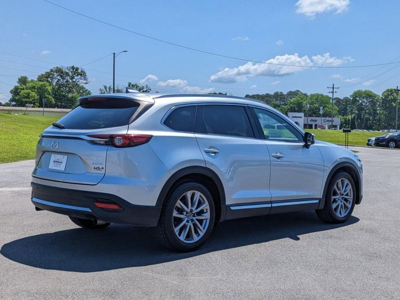 2021 Mazda CX-9 Grand Touring in a Sonic Silver Metallic exterior color. Johnson Dodge 601-693-6343 pixelmotiondemo.com 