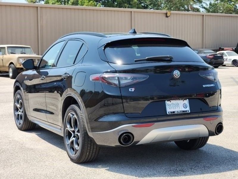 2024 Alfa Romeo Stelvio Ti in a Vulcano Black Metallic exterior color and Blackinterior. Northside Imports Houston 281-475-4549 northsideimportshouston.com 