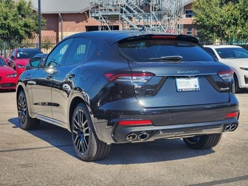 2024 Maserati Levante Modena in a Black exterior color and Black/Redinterior. Northside Imports Houston 281-475-4549 northsideimportshouston.com 