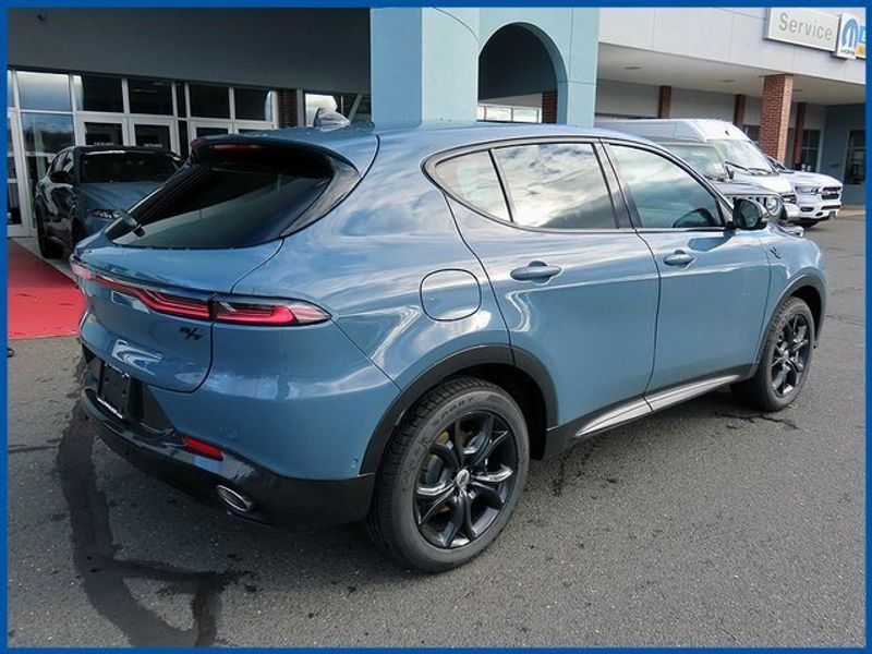 2024 Dodge Hornet R/T Plus in a Blue Steele exterior color and Blackinterior. Papas Jeep Ram In New Britain, CT 860-356-0523 papasjeepram.com 