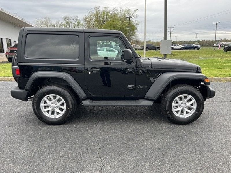 2023 Jeep Wrangler 2-door Sport S 4x4 in a Black Clear Coat exterior color and Blackinterior. Lakeshore CDJR Seaford 302-213-6058 lakeshorecdjr.com 