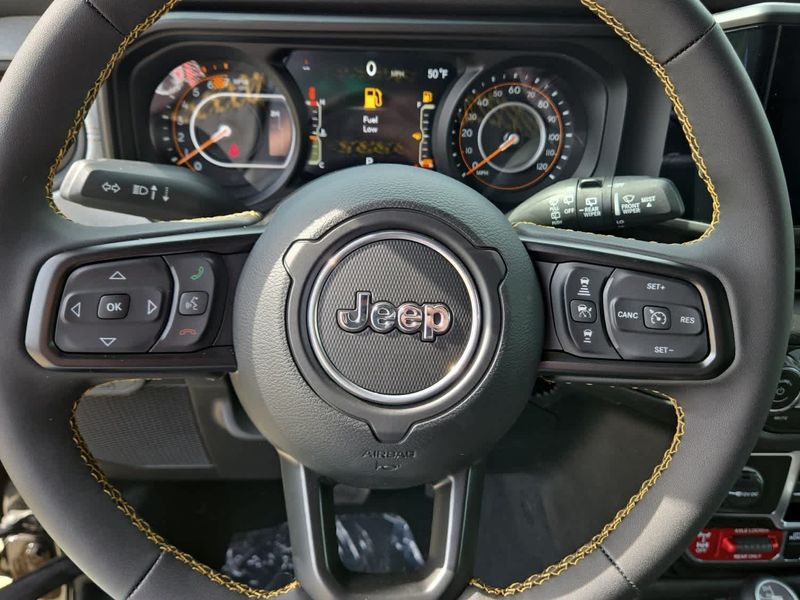2024 Jeep Wrangler 4-door Willys in a Black Clear Coat exterior color and Blackinterior. Dave Warren Chrysler Dodge Jeep Ram (716) 708-1207 davewarrenchryslerdodgejeepram.com 