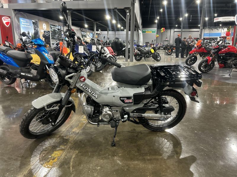 2025 Honda TRAIL 125  in a PEARL SMOKY GRAY exterior color. Del Amo Motorsports of Redondo Beach (424) 390-7811 delamomotorsports.com 