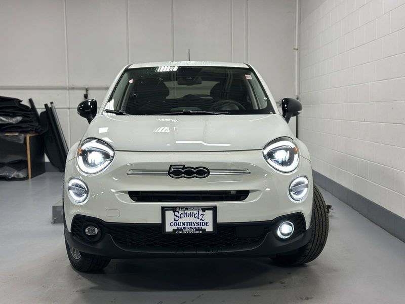 2023 Fiat 500x Pop Awd in a Bianco Gelato (White Clear Coat) exterior color and Blackinterior. Schmelz Countryside Alfa Romeo and Fiat (651) 968-0556 schmelzfiat.com 