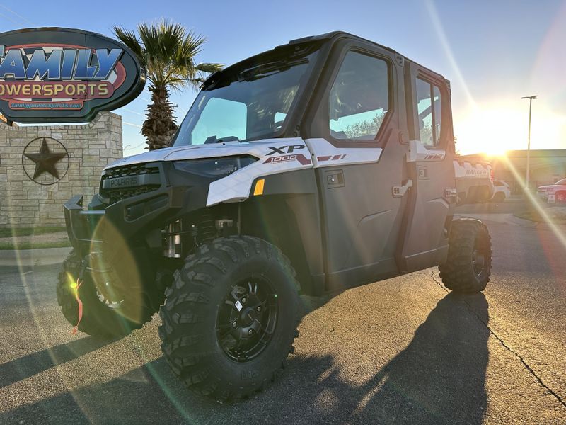 2025 Polaris RANGER CREW XP 1000 NORTHSTAR TRAIL BOSS EDITION CRYSTAL WHITE WITH PERFORMANCE RED ACCENTSImage 1