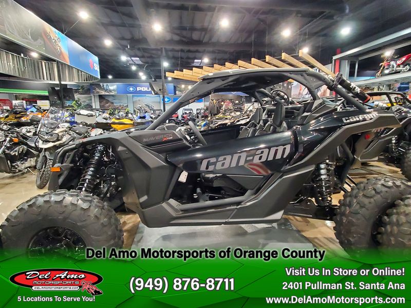 2024 Can-Am 7TRG  in a TRIPLE BLACK exterior color. Del Amo Motorsports of Orange County (949) 416-2102 delamomotorsports.com 