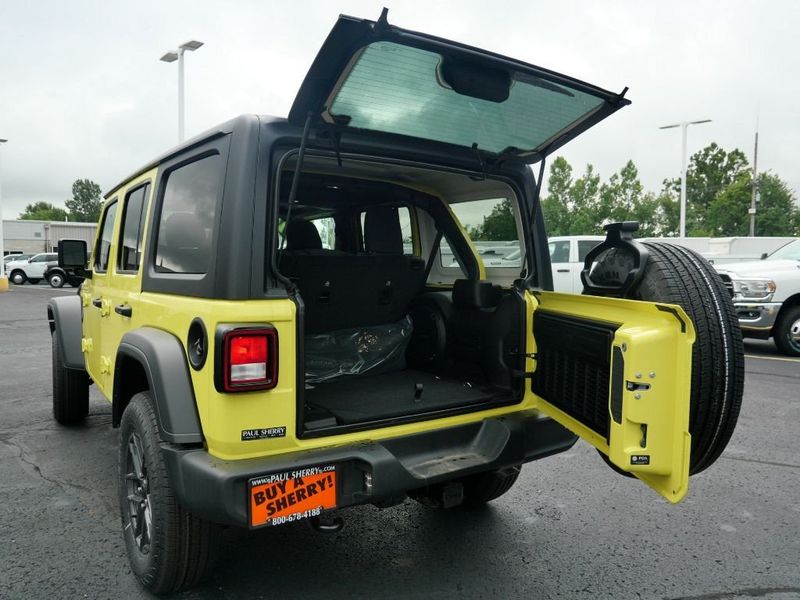 2024 Jeep Wrangler 4-door Sport S in a High Velocity Clear Coat exterior color and Blackinterior. Paul Sherry Chrysler Dodge Jeep RAM (937) 749-7061 sherrychrysler.net 