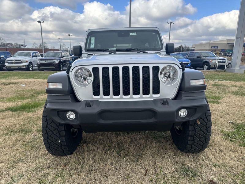 2024 Jeep Wrangler 4-door Sport S in a Silver Zynith Clear Coat exterior color and Blackinterior. Gupton Motors Inc 615-384-2886 guptonmotors.com 