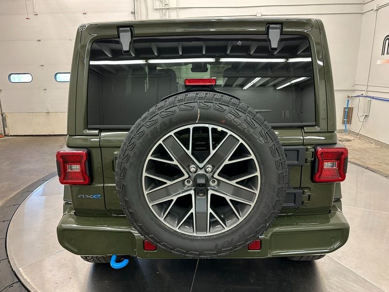 2024 Jeep Wrangler 4-door High Altitude 4xe in a Sarge Green Clear Coat exterior color and Green/Blackinterior. Marina Chrysler Dodge Jeep RAM (855) 616-8084 marinadodgeny.com 