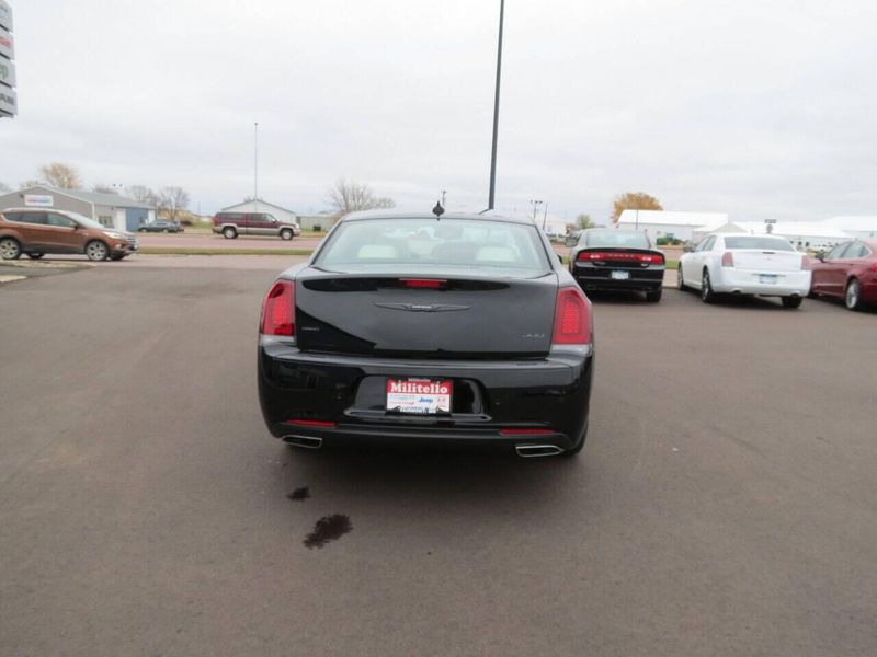 2023 Chrysler 300 Touring L Awd in a Gloss-Black exterior color and Taninterior. Militello Motors ​507-200-4344 militellomotors.net 