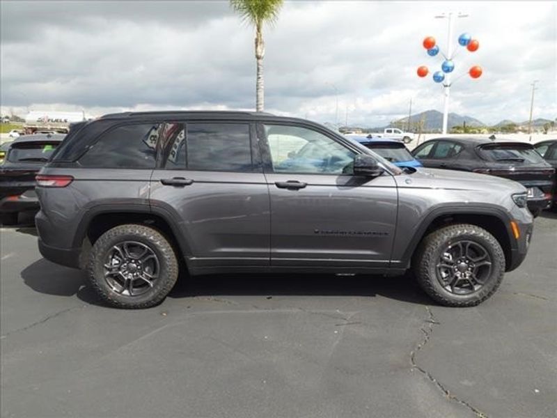 2024 Jeep Grand Cherokee Trailhawk 4xe in a Baltic Gray Metallic Clear Coat exterior color and Global Blackinterior. Perris Valley Auto Center 951-657-6100 perrisvalleyautocenter.com 