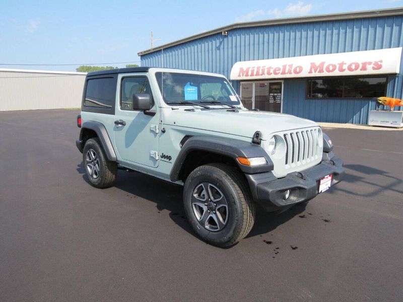 2023 Jeep Wrangler 2-door Sport S 4x4 in a Earl Clear Coat exterior color and Blackinterior. Militello Motors ​507-200-4344 militellomotors.net 