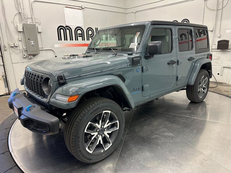 2024 Jeep Wrangler 4-door Sport S 4xe in a Anvil Clear Coat exterior color and Blackinterior. Marina Auto Group (855) 564-8688 marinaautogroup.com 