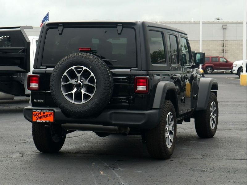 2024 Jeep Wrangler 4-door Sport S in a Black Clear Coat exterior color and Blackinterior. Paul Sherry Chrysler Dodge Jeep RAM (937) 749-7061 sherrychrysler.net 