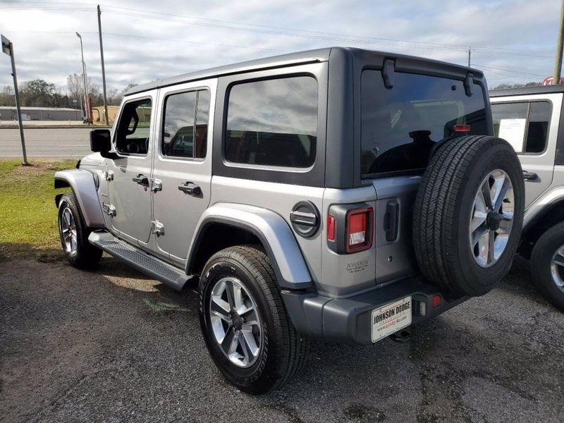 2020 Jeep Wrangler Unlimited Sahara in a Billet Silver Metallic Clear Coat exterior color and Blackinterior. Johnson Dodge 601-693-6343 pixelmotiondemo.com 