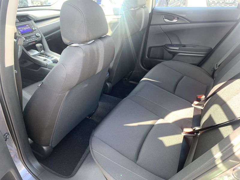 2020 Honda Civic Sedan LX in a White exterior color. BEACH BLVD OF CARS beachblvdofcars.com 