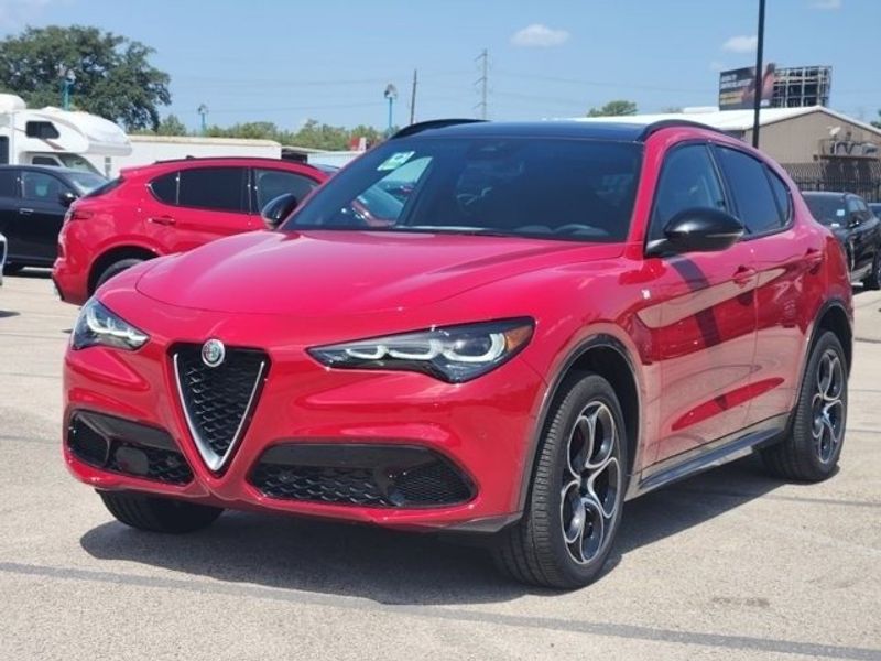 2024 Alfa Romeo Stelvio Ti in a Alfa Rosso exterior color and Blackinterior. Northside Imports Houston 281-475-4549 northsideimportshouston.com 