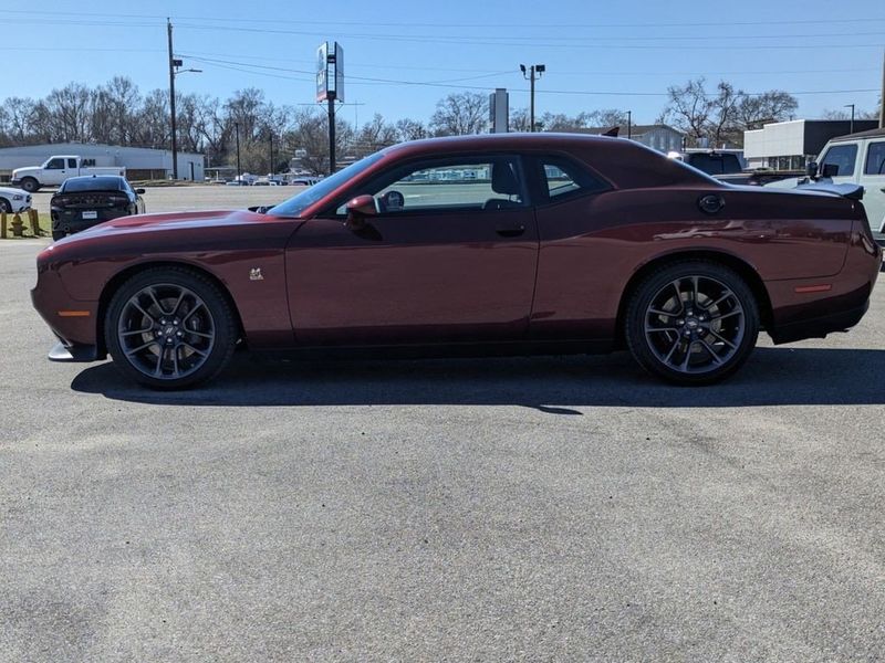 2023 Dodge Challenger R/T Scat Pack in a Octane Red exterior color and Blackinterior. Johnson Dodge 601-693-6343 pixelmotiondemo.com 