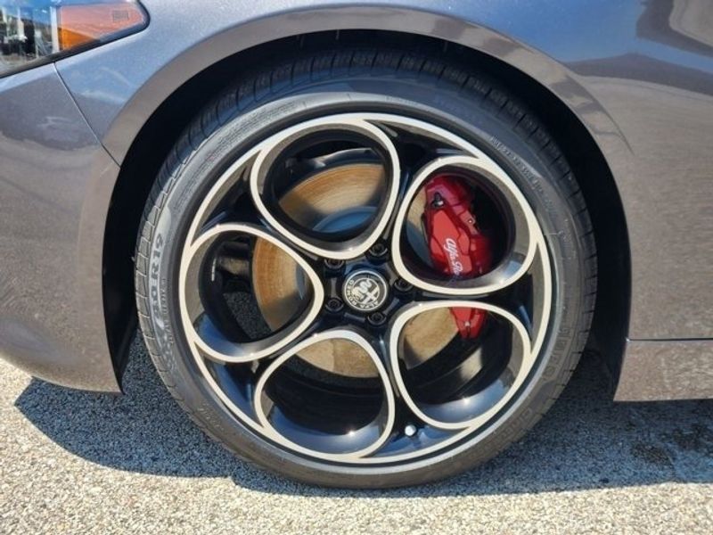 2024 Alfa Romeo Giulia Ti Rwd in a Vesuvio Gray Metallic exterior color and Blackinterior. Northside Alfa Romeo of Houston 281-475-4549 alfaromeousaofnorthhouston.com 