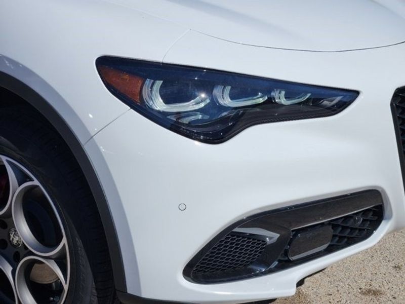 2024 Alfa Romeo Stelvio Sprint in a Alfa White exterior color and Blackinterior. Northside Imports Houston 281-475-4549 northsideimportshouston.com 