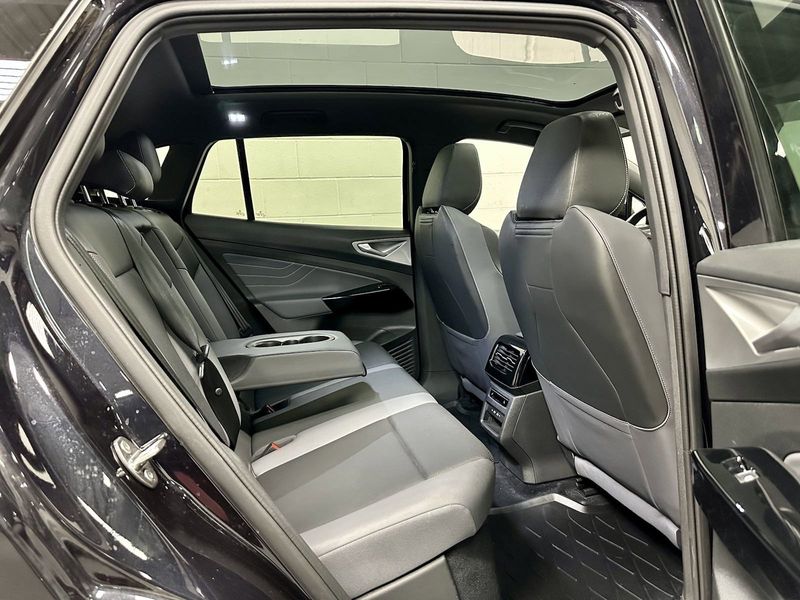 2023 Volkswagen ID.4 Pro S Plus w/Navigation in a Deep Black Pearl exterior color and Black Heated Massaging Seatsinterior. Schmelz Countryside SAAB (888) 558-1064 stpaulsaab.com 