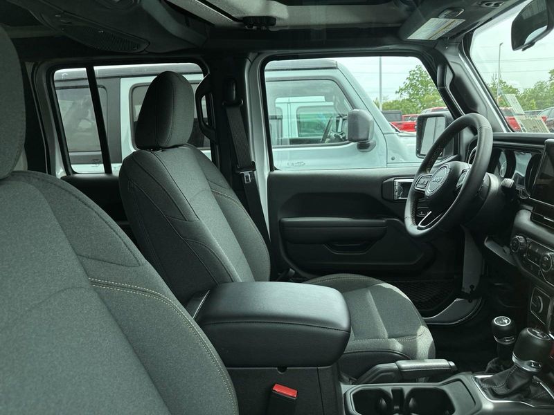 2024 Jeep Wrangler 4-door Willys in a Silver Zynith Clear Coat exterior color and Blackinterior. Gupton Motors Inc 615-384-2886 guptonmotors.com 