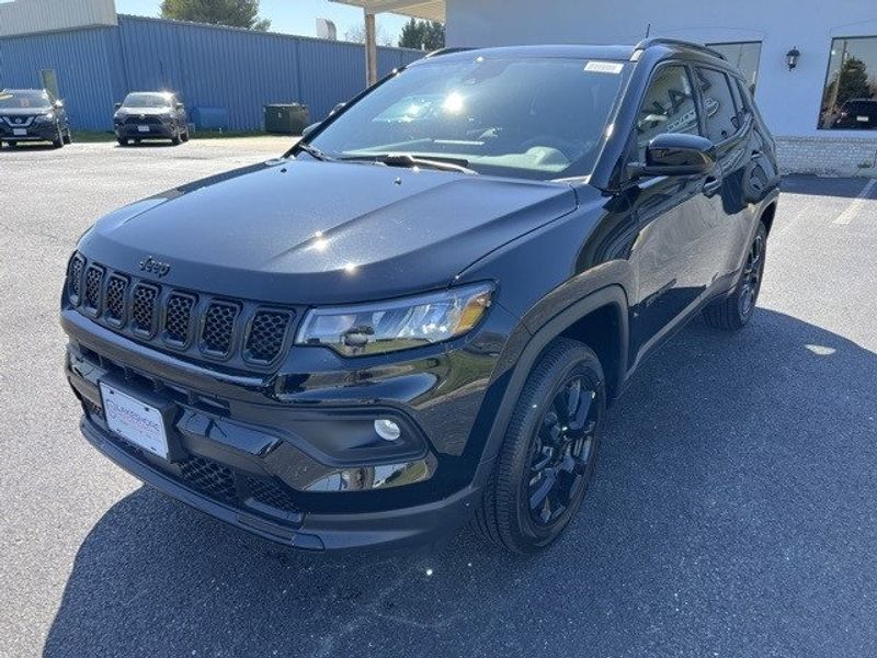 2023 Jeep Compass Altitude 4x4 in a Diamond Black Crystal Pearl Coat exterior color and Blackinterior. Lakeshore CDJR Seaford 302-213-6058 lakeshorecdjr.com 